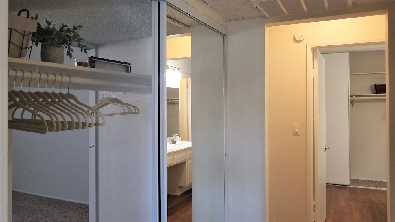 Large walk-in closet with access from the bedroom and hallway
